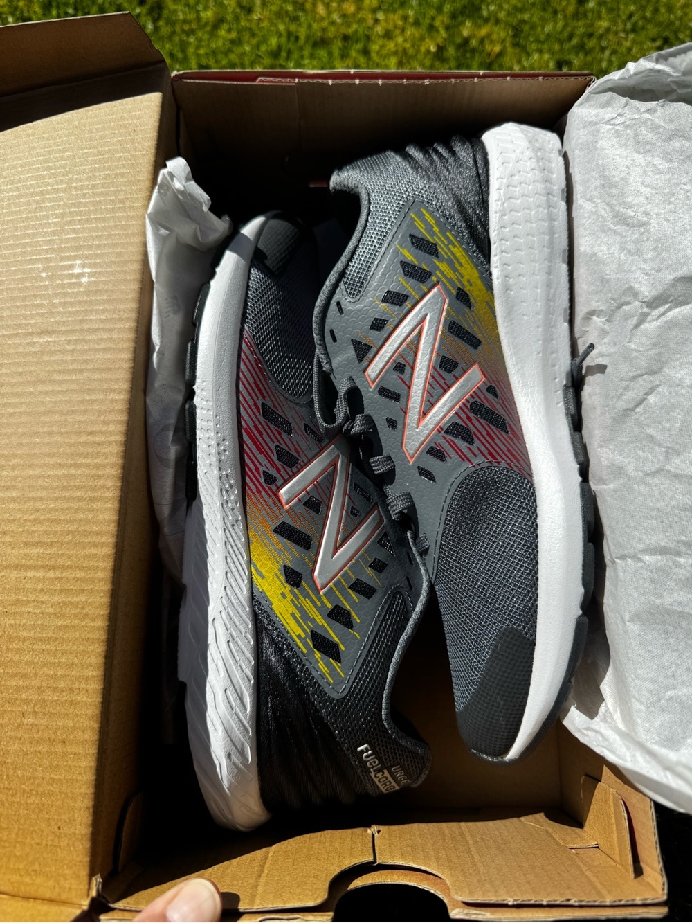 New Balance Youth Gray Athletic Shoes with Yellow & Red Accents